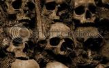 Stock-photo-wall-full-of-skulls-and-bones-in-the-bone-chapel-in-evora-portugal-6959644